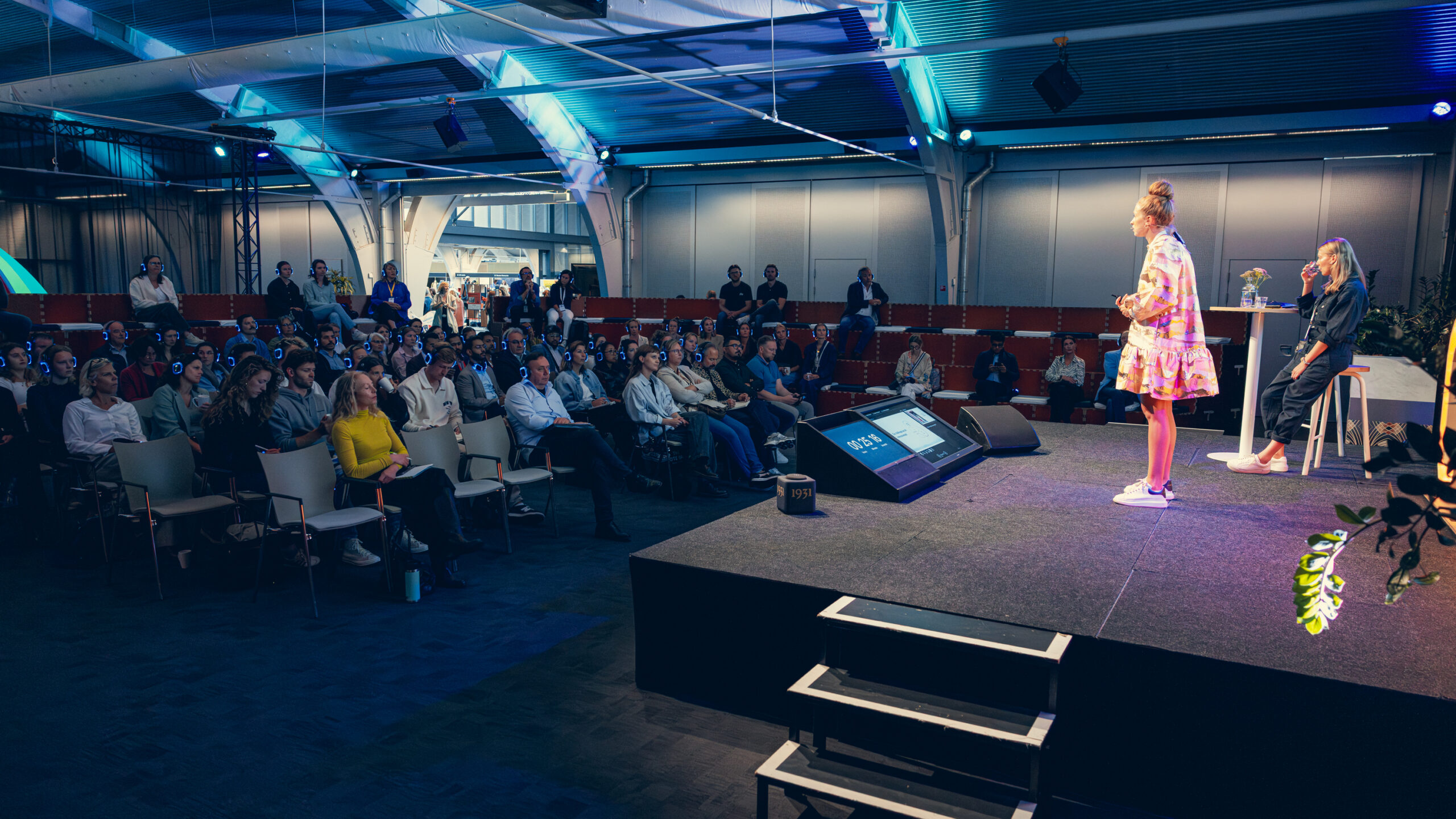 Speaker presenting on stage at Circular Textile Days circular textile industry conference.